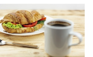 Image of croissant and coffee cup for Catering information